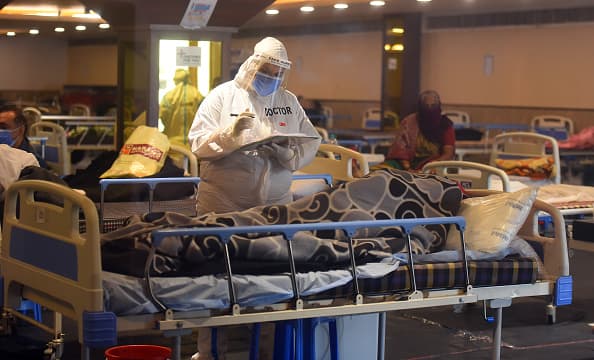  India’s daily coronavirus cases climb to new world record as hospitals buckle