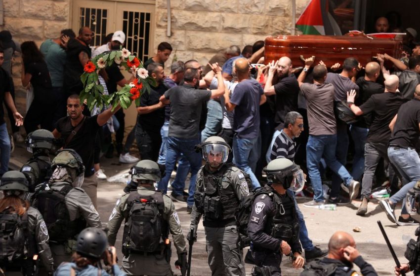  Israeli police beat mourners at funeral of slain Palestinian journalist