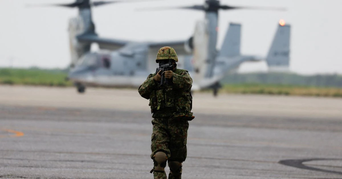  Japan warns of rising security threats in annual defence report
