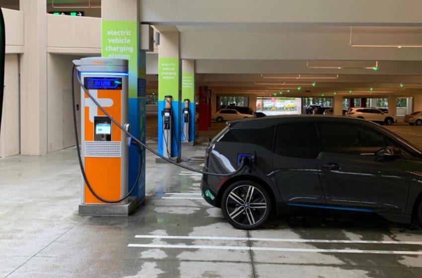  Automakers need way more plug-in stations to make their EV plans work. That has sparked a buying frenzy as big charging players gobble up smaller ones.