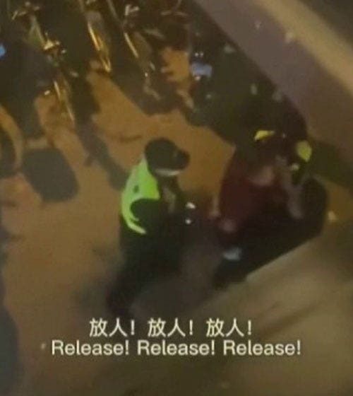  Video shows Chinese officers arresting BBC reporter as China defends detention